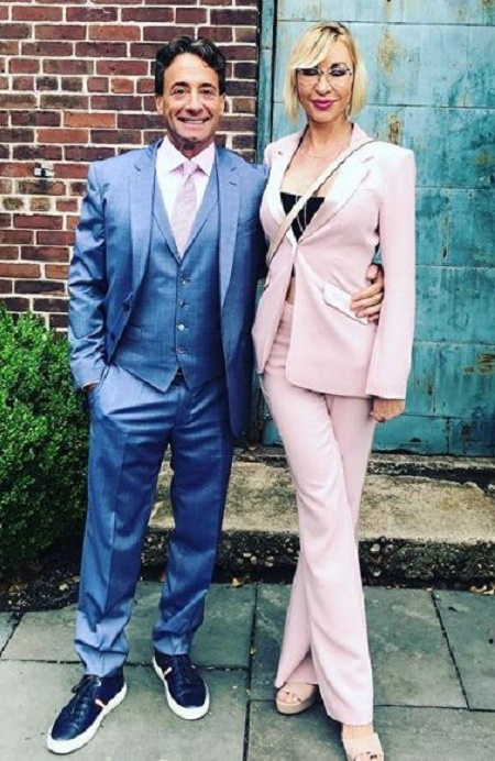 Andrew Lessman and Muriel Angot attended friend's wedding on 25 June 2018